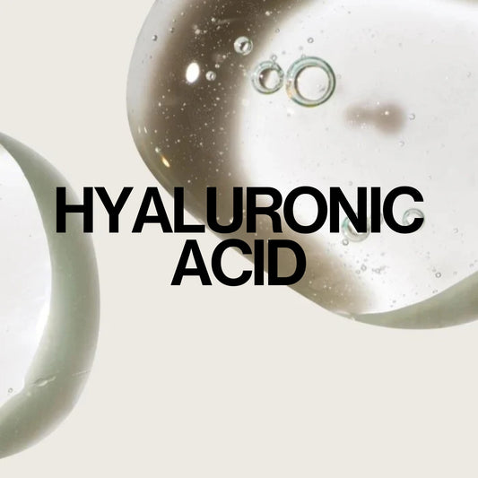 Clear serum droplets with text "Hyaluronic Acid" showcasing hydration skincare benefits.