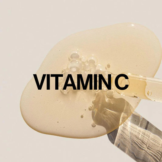 Brightening serum liquid with Vitamin C, featuring a dropper dispensing serum on a neutral background.